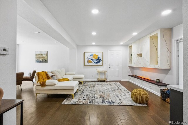 living room with dark wood-type flooring