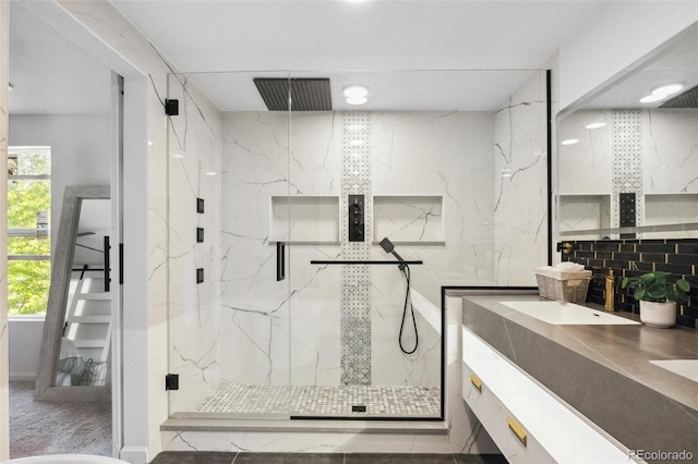 bathroom featuring vanity and walk in shower