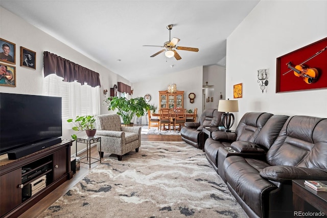 4421 Sunshine Cir, Loveland, CO 80538 - living room featuring a ceiling fan, wood finished floors, and vaulted ceiling