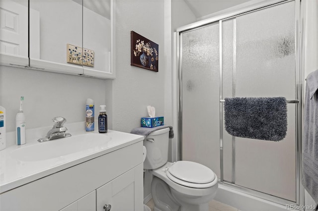 4421 Sunshine Cir, Loveland, CO 80538 - full bath featuring a stall shower, vanity, and toilet