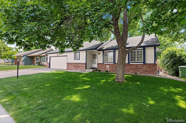 4421 Sunshine Cir, Loveland, CO 80538 - single story home with brick siding, concrete driveway, a front yard, and an attached garage