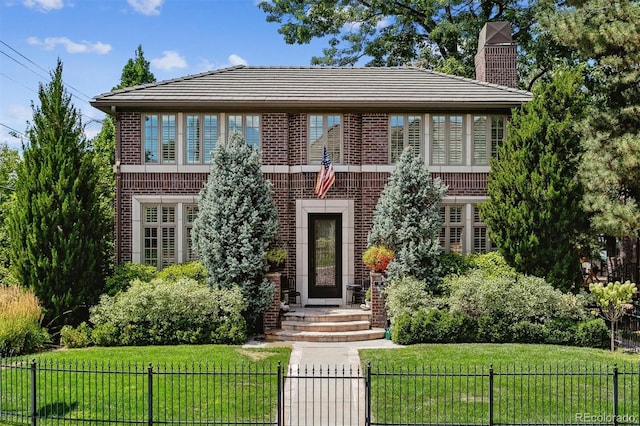 tudor house with a front yard