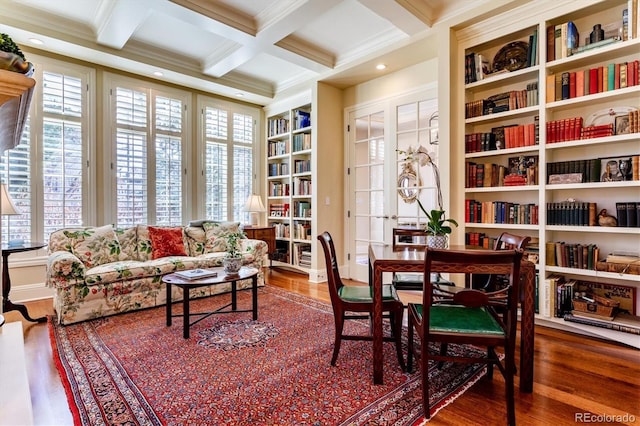 sitting room with beamed ceiling, ornamental molding, coffered ceiling, and dark hardwood / wood-style flooring