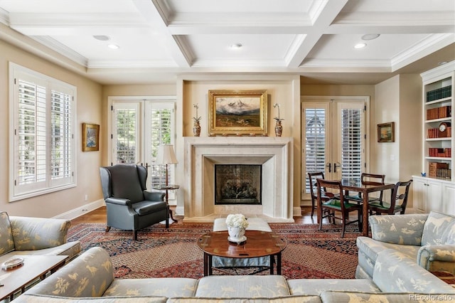 living room featuring beamed ceiling, coffered ceiling, and hardwood / wood-style floors