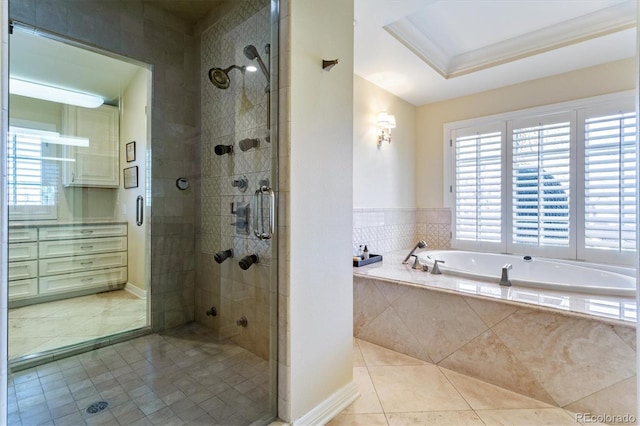 bathroom with crown molding, tile patterned floors, and shower with separate bathtub