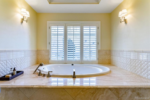 bathroom with tiled bath