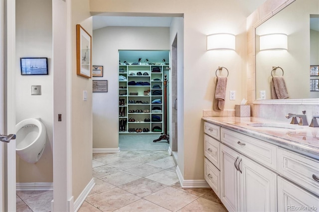 bathroom featuring vanity and tile patterned floors