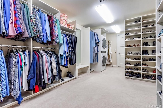 spacious closet with carpet floors