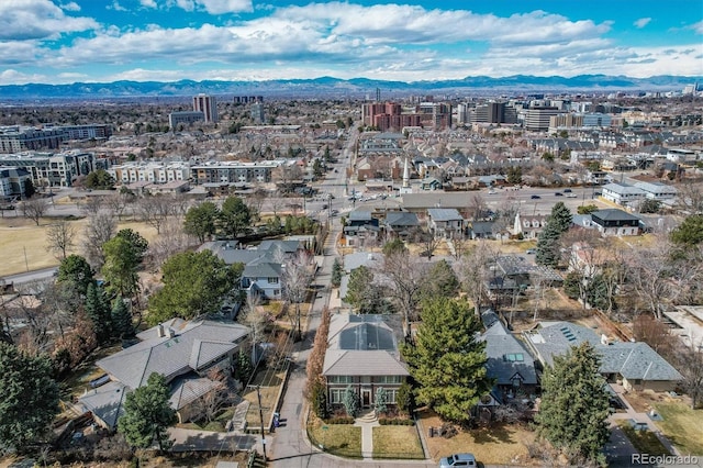 birds eye view of property with a mountain view