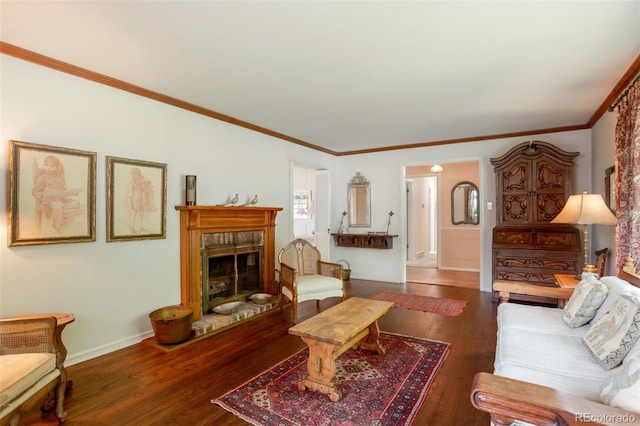 2309 E Floyd Pl, Englewood, CO 80113 - living room featuring wood finished floors, a fireplace, and ornamental molding