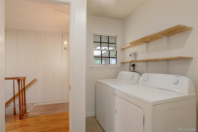 2309 E Floyd Pl, Englewood, CO 80113 - laundry area featuring separate washer and dryer and light wood finished floors
