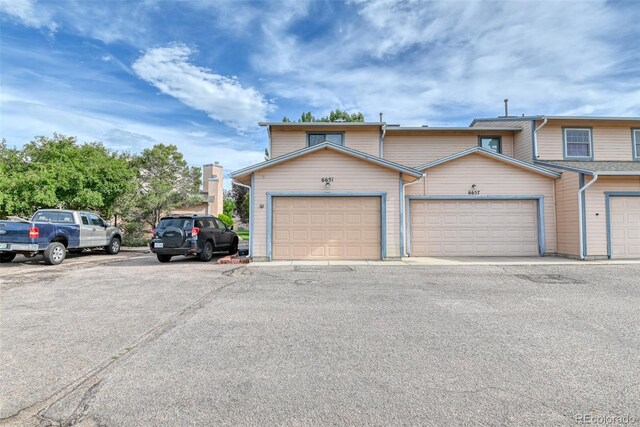 view of front of property featuring a garage