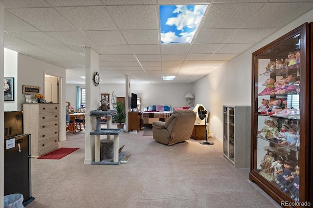 1176 E Purcell Ln, Pueblo, CO 81007 - living room featuring carpet flooring and a drop ceiling