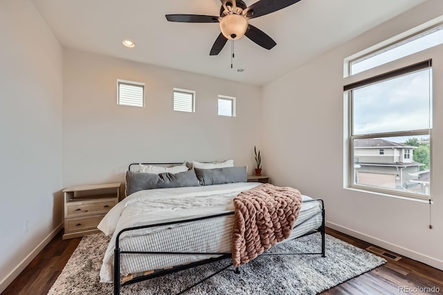 2592 Sweet Wind Ave, Castle Rock, CO 80109 - bedroom with multiple windows, dark wood-style floors, a ceiling fan, and recessed lighting