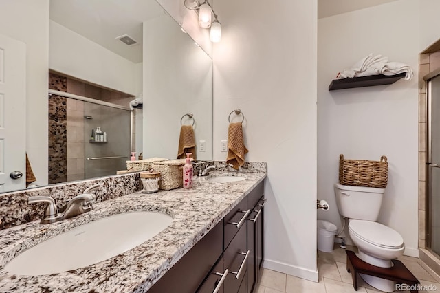 2592 Sweet Wind Ave, Castle Rock, CO 80109 - full bath with double vanity, a shower stall, and tile patterned flooring