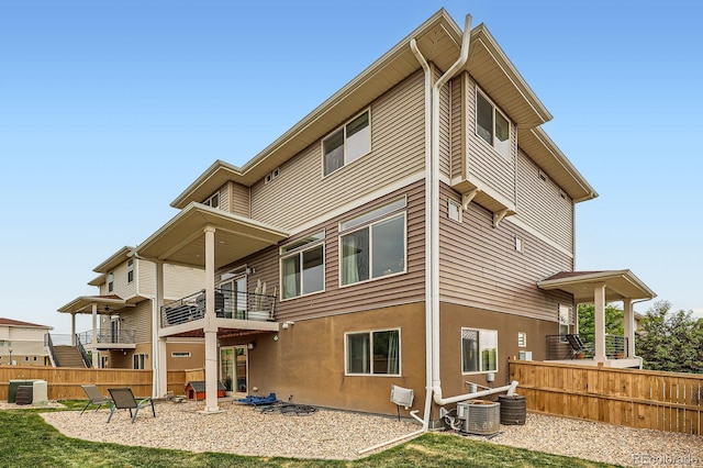 2592 Sweet Wind Ave, Castle Rock, CO 80109 - rear view of house with a balcony and stucco siding