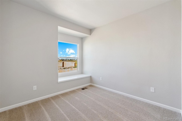 empty room with carpet floors