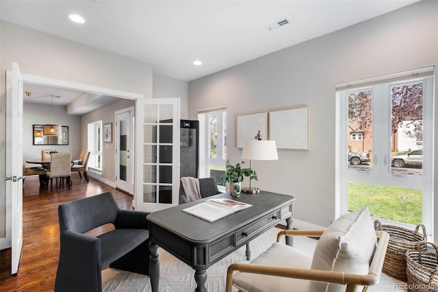 home office featuring wood finished floors, healthy amount of natural light, baseboards, and recessed lighting