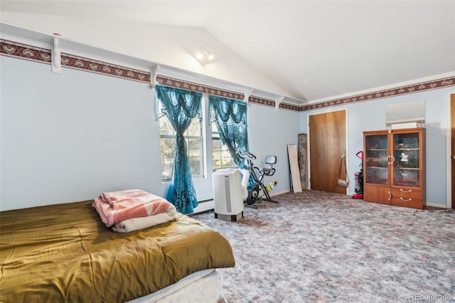 carpeted bedroom with vaulted ceiling