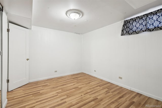 unfurnished room with wood-type flooring