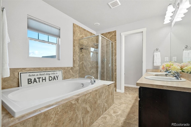 bathroom with visible vents, a stall shower, a sink, double vanity, and a bath