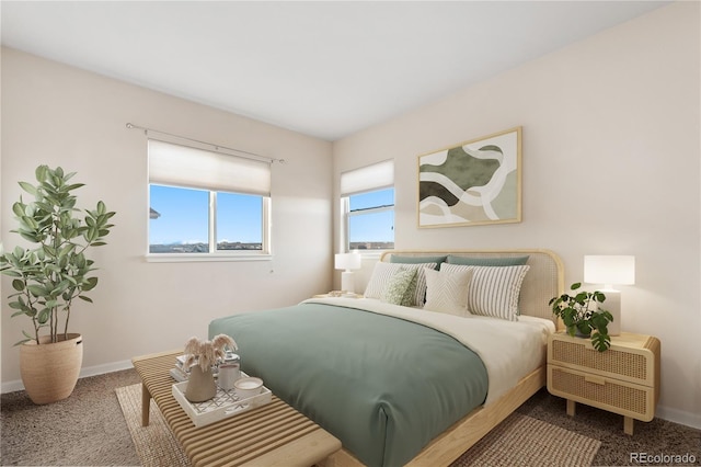 carpeted bedroom with baseboards