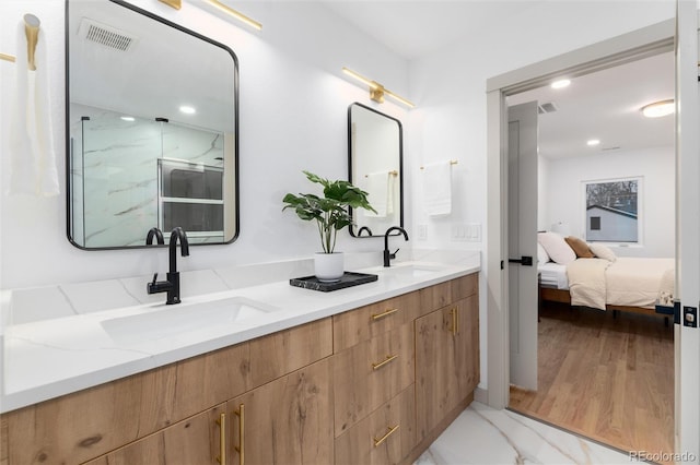 bathroom with vanity and walk in shower