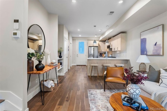 living room featuring dark hardwood / wood-style floors