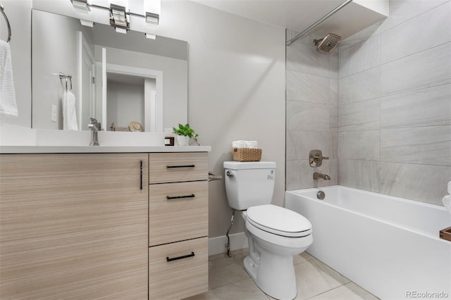 full bathroom with tiled shower / bath combo, tile patterned floors, vanity, and toilet