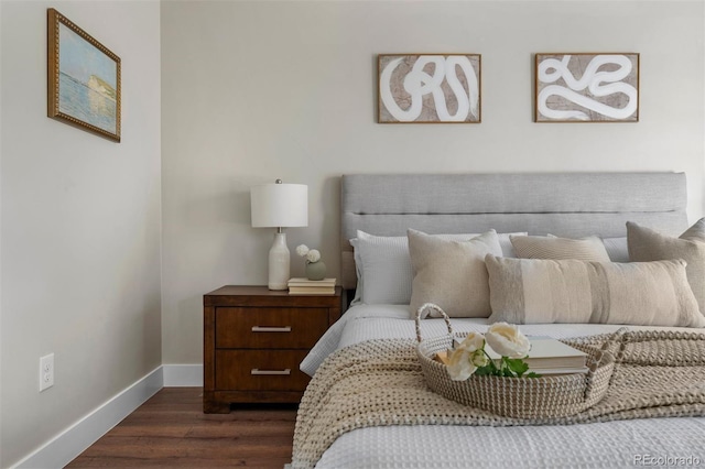 bedroom featuring dark wood-type flooring