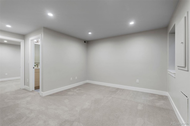 basement with light colored carpet