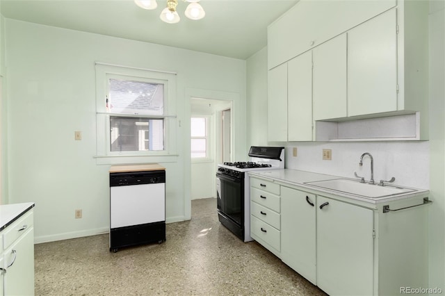 kitchen with baseboards, dishwasher, gas range oven, light countertops, and a sink