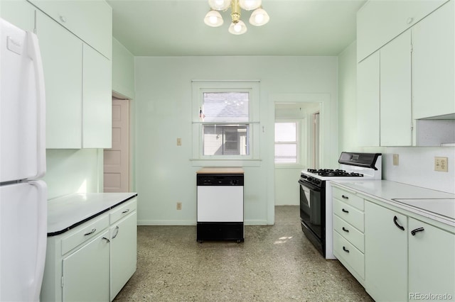 kitchen with white appliances, baseboards, white cabinets, light countertops, and a chandelier