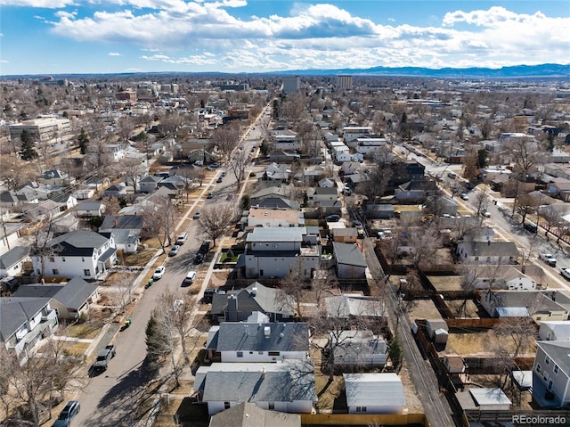 drone / aerial view with a residential view and a mountain view