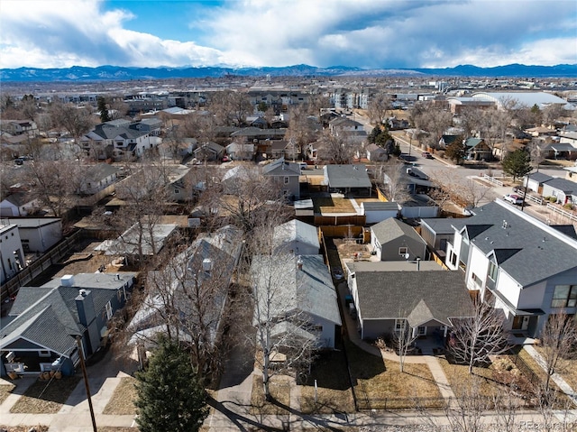 drone / aerial view featuring a mountain view and a residential view