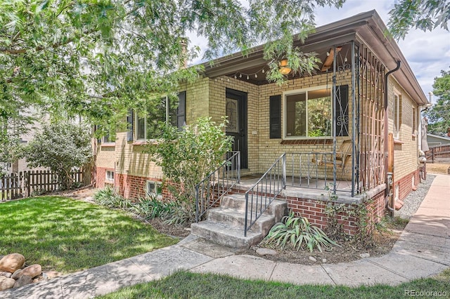 view of front of house with a front lawn