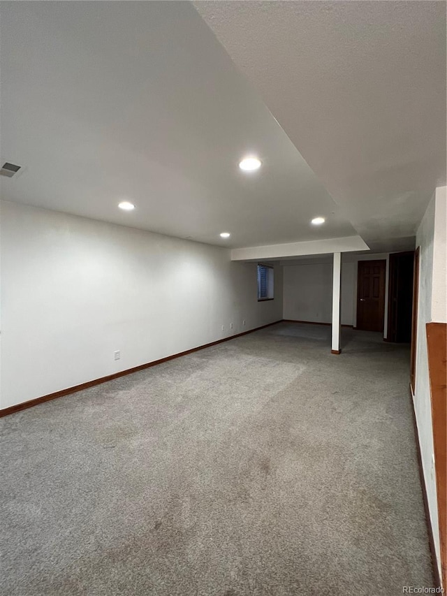 basement featuring carpet floors