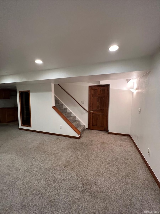 basement with carpet flooring