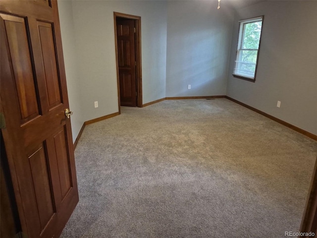 2477 S Oakland Cir, Aurora, CO 80014 - empty room with light carpet and baseboards