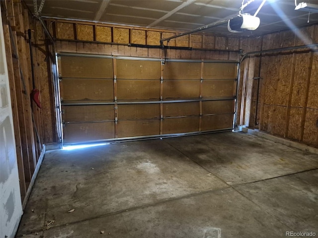 2477 S Oakland Cir, Aurora, CO 80014 - garage featuring a garage door opener