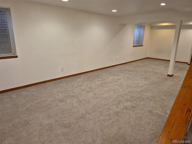 2477 S Oakland Cir, Aurora, CO 80014 - finished below grade area featuring carpet flooring, recessed lighting, and baseboards