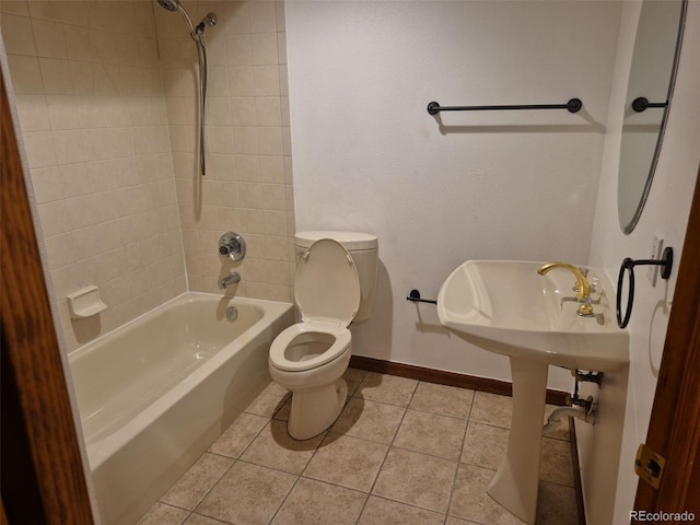 2477 S Oakland Cir, Aurora, CO 80014 - full bathroom featuring  shower combination, toilet, baseboards, and tile patterned floors
