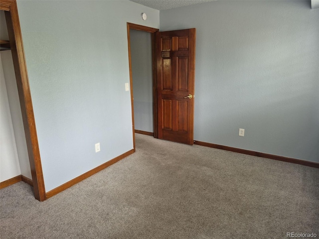 2477 S Oakland Cir, Aurora, CO 80014 - unfurnished bedroom with carpet and baseboards