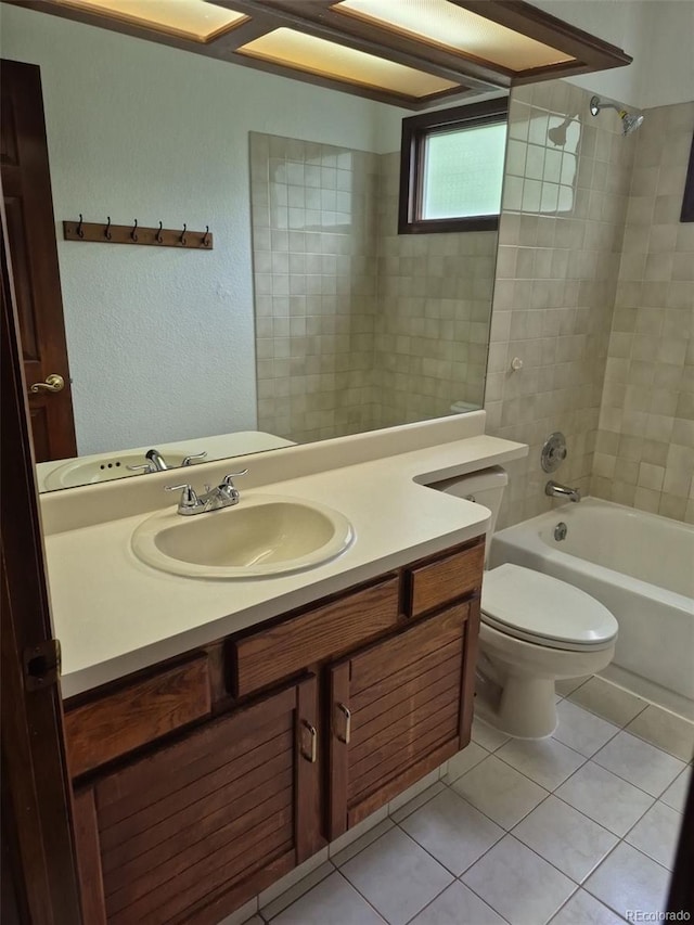 2477 S Oakland Cir, Aurora, CO 80014 - bathroom with tile patterned flooring, vanity, shower / tub combination, and toilet
