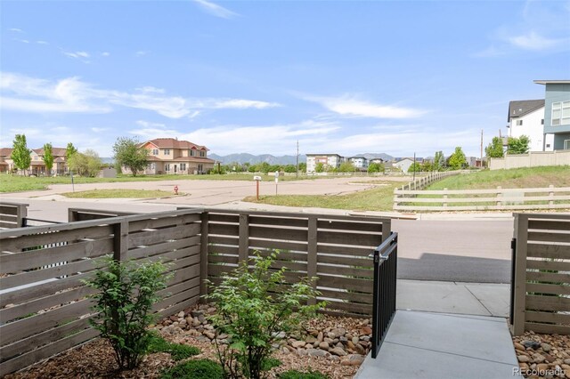 928 Cimarron Dr Unit C, Lafayette, CO 80026 - view of yard featuring a mountain view and a residential view