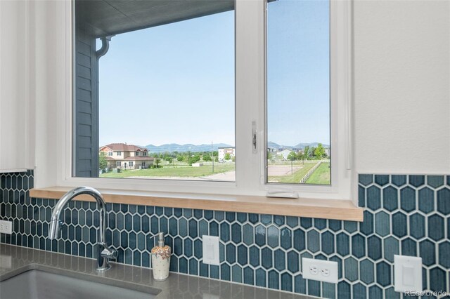 928 Cimarron Dr Unit C, Lafayette, CO 80026 - kitchen view of a sink and backsplash