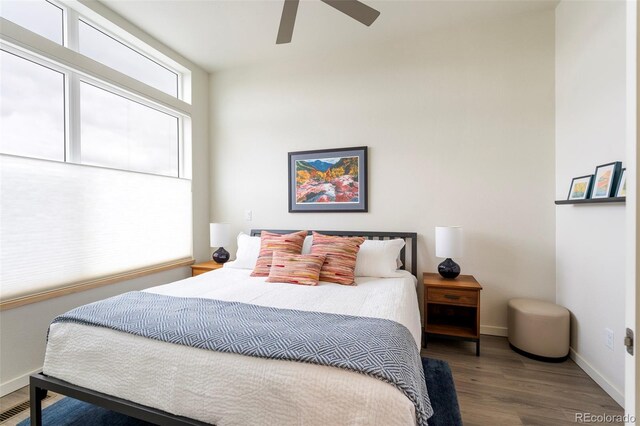 928 Cimarron Dr Unit C, Lafayette, CO 80026 - bedroom featuring wood finished floors, baseboards, and a ceiling fan