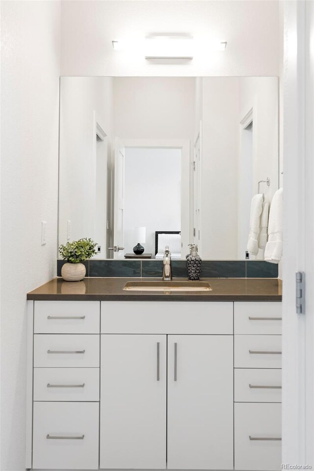 928 Cimarron Dr Unit C, Lafayette, CO 80026 - bathroom featuring vanity
