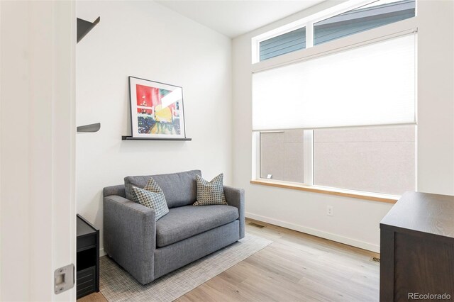 928 Cimarron Dr Unit C, Lafayette, CO 80026 - living area featuring light wood finished floors and baseboards