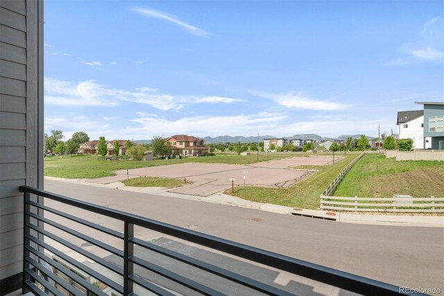 928 Cimarron Dr Unit C, Lafayette, CO 80026 - balcony featuring a mountain view and a residential view